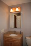 An american style remodeled bathroom with brookhaven cabinetry.