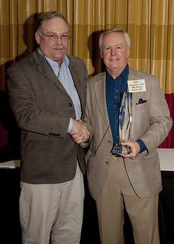 Businessperson of the year award from Sen design group.