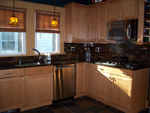 A modern maple kitchen with shaker doors.