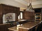 A wood-mode kitchen with decorative raised panels