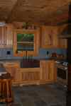 A medallion kitchen with hickory wood and a custom stain.