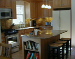 Maple brookhaven kitchen with an island.