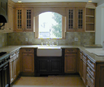 A country kitchen with an apron sink.
