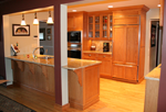 A classic oak kitchen with flat panel doors.